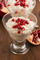Dish of banana millet breakfast pudding with pomegranate