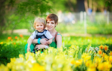 Fototapeta premium the girl with the son outdoors