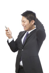 スマホ／男性ビジネスマン