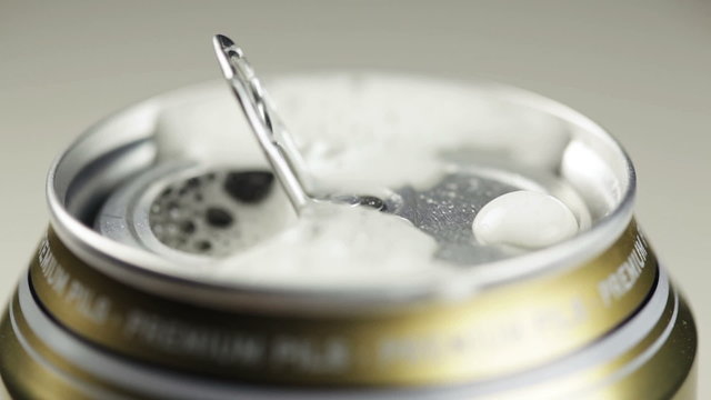 Opening a beer can