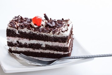 Close up of Black forest cake isolated on white
