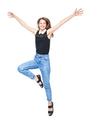 Happy young teenager girl jumping isolated