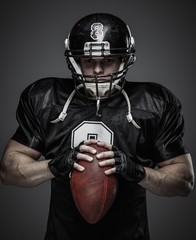 American football player with ball © Nejron Photo