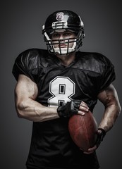 American football player with ball