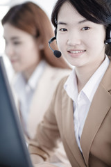 Asian women call center with phone headset