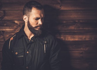 Handsome man with beard  wearing waxed canvas jacket