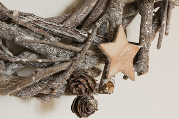 branches woven christmas decoration with wooden star and little