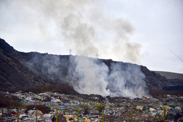 Fototapeta premium Garbage pile outside the city