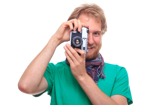 Portrait of man with classic camera