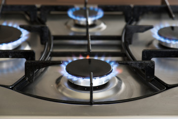 Blue flames of a gas stove