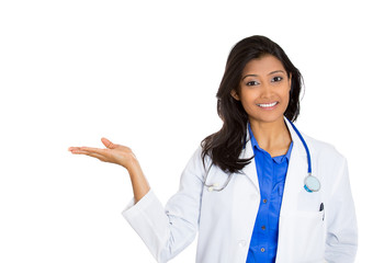 smiling confident female doctor presenting pointing copy space