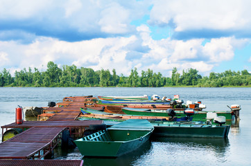 Traditional fishing boats tied up on the floating dock