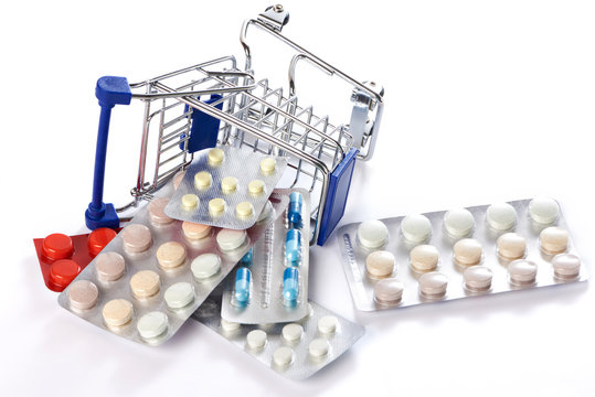 Shopping trolley with pills isolated