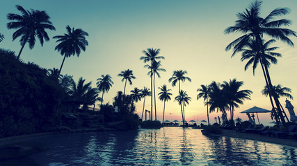 Plakat Tropical beach after sunset. Cross-process style photo.