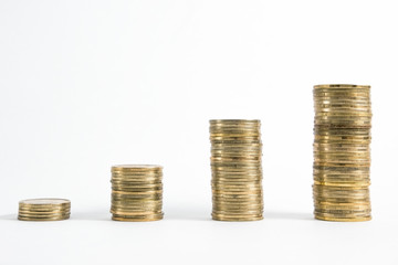 Columns of coins isolated on white background