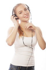 Naklejka premium Woman with headphones listening music