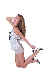 Fashion woman in shorts and polka dot blouse
