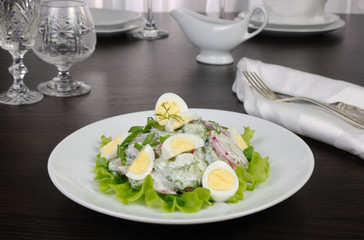 Radish salad with cucumber and eggs for milk sauce