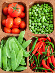 Fresh green peas, tomato and chili