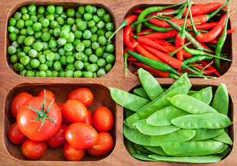 Fresh green peas, tomato and chili