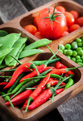 Fresh green peas, tomato and chili