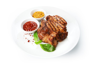 Restaurant food isolated - grilled pork chops with sauces
