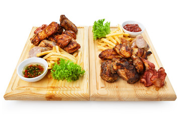 Restaurant food isolated - grilled meat assortment served on woo
