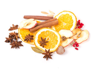 Christmas spices and dried orange sliceson