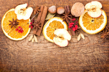 Christmas spices and dried orange sliceson