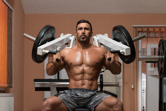 Bodybuilder Exercising Shoulders