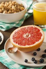 Fototapeta na wymiar Healthy Organic Grapefruit for Breakfast