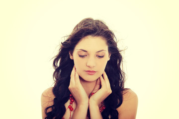 Naklejka premium Beautiful brunette woman with red necklace.
