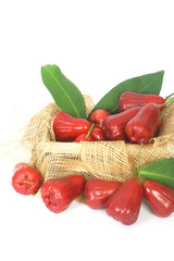 Rose apples on wooden crate