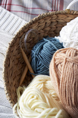 Fototapeta na wymiar Knitting tools basket on bed,close up
