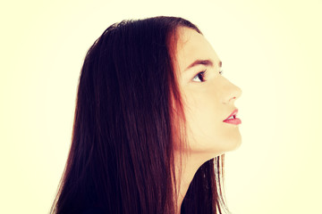 Naklejka premium Beautiful woman looking up.