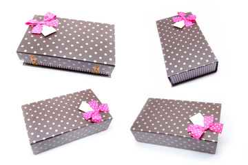 brown box with gifts and pink bow