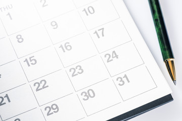 Calendar.With a Ballpoint pen.