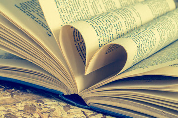 love heart in a book with filter effect retro vintage style