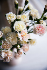 delicate bouquet of carnations in vintage style