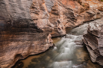 Fototapeta na wymiar creek flowing over the rocks