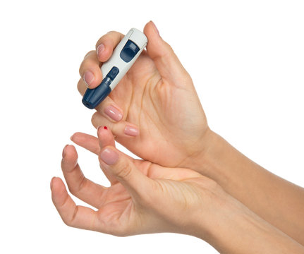 Diabetes diabetic concept finger prick for glucose sugar measuri