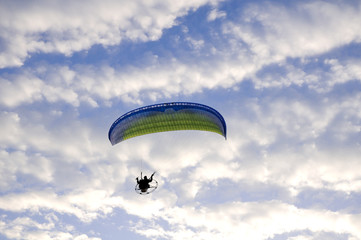 paramotor in the cloudy sky