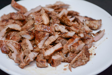 slice roasted pork on dish
