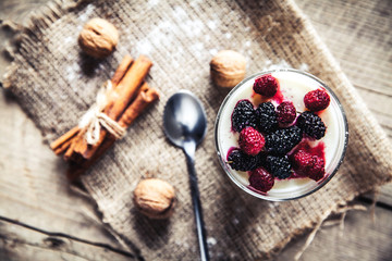 Healthy breakfast - Dairy yogurt with raspberry, mulberry