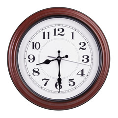 Round clock shows half of the ninth