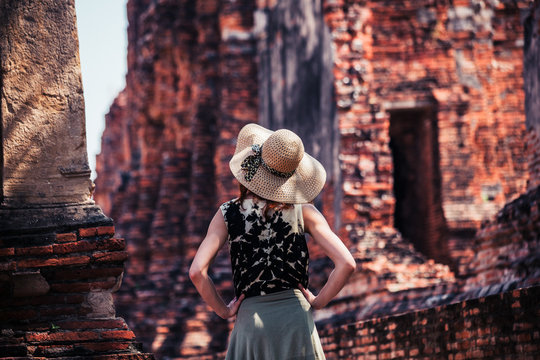 Woman exploring ancient ruins