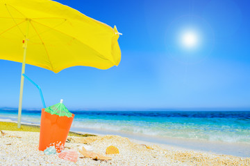 umbrella and cocktail under a shining sun