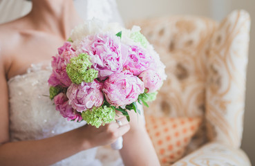 bride holding a wedding bouquet