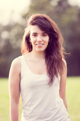 Beautiful young happy woman with long dark hair