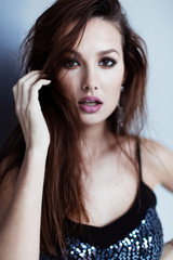 Beauty portrait of girl in top with sequins